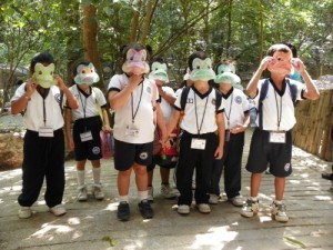 Children wearing their frog masks at Zoo “Miguel Alvarez del Toro” (ZooMAT) in Chiapas, Mexico. 